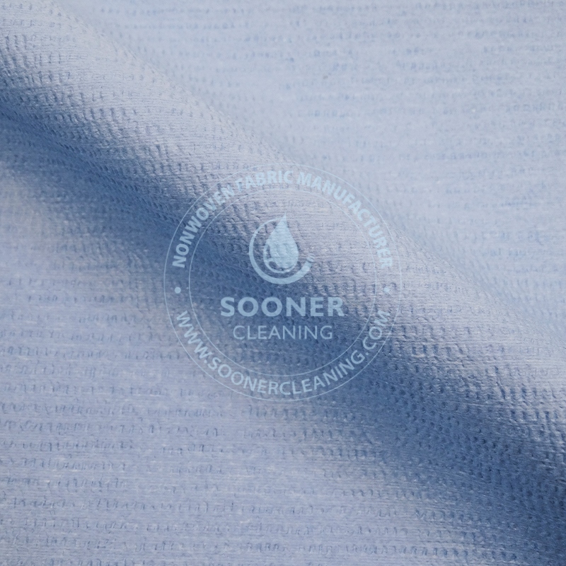 Woodpulp PET embossed spunlace nonwoven fabrics